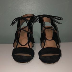 Suede black high heels. Heel is about 3” tall.